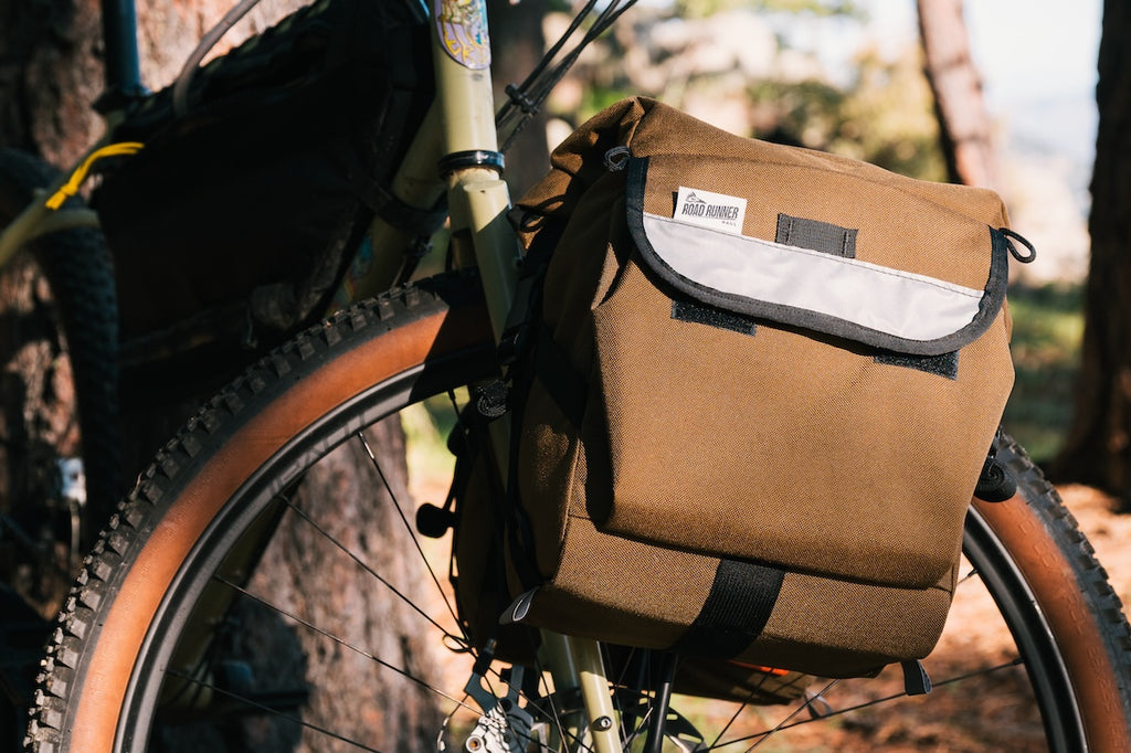 Road Runner Bags Anywhere Panniers attached to a front rack on a mountain bike