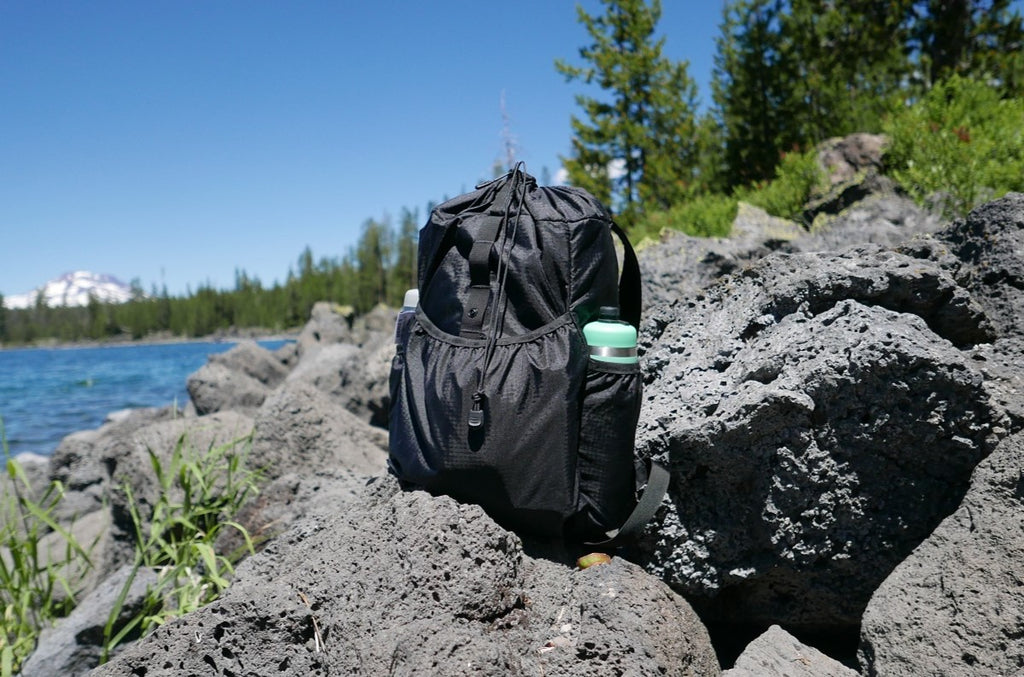 Comrad Packable lightweight backpack in black ripstop